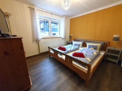 Ein Bett oder Betten in einem Zimmer der Unterkunft Kleine Bergstraße 2 - Haus 1