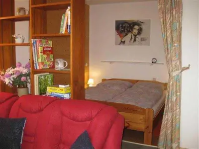 Ein Bett oder Betten in einem Zimmer der Unterkunft Ferienwohnung Klingelhöfer E-III-2-6
