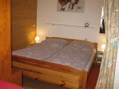 Ein Bett oder Betten in einem Zimmer der Unterkunft Ferienwohnung Klingelhöfer E-III-2-6