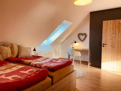 Ein Bett oder Betten in einem Zimmer der Unterkunft Apartment an der Wurmbergseilbahn 3
