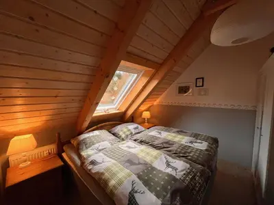Ein Bett oder Betten in einem Zimmer der Unterkunft Hexenstuben Tanne - 4 DTV Sterne