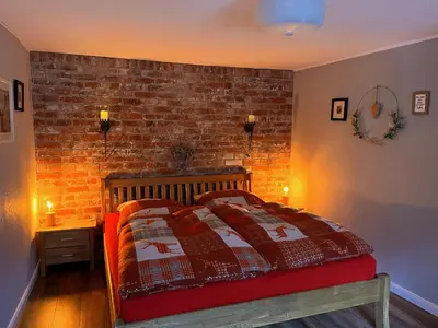 Ein Bett oder Betten in einem Zimmer der Unterkunft Hexenstuben Tanne - 4 DTV Sterne