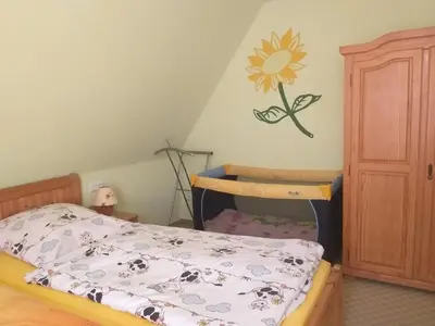 Ein Bett oder Betten in einem Zimmer der Unterkunft Harzer Bauernhof
