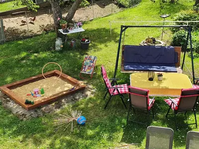 Ein Garten an der Unterkunft Ferienhaus 