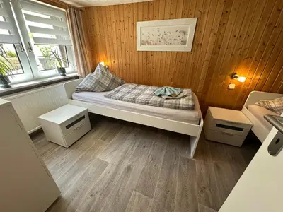 Ein Bett oder Betten in einem Zimmer der Unterkunft Christels Ferienwohnung 1 in Thale mit Sonnenterrasse und Grill