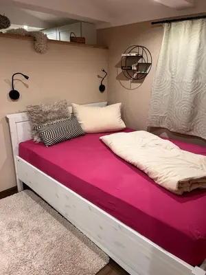 Ein Bett oder Betten in einem Zimmer der Unterkunft kleines Harz-Chalet
