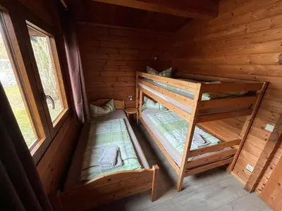 Ein Bett oder Betten in einem Zimmer der Unterkunft Ferienhaus Kröger -kostenloses Wlan-