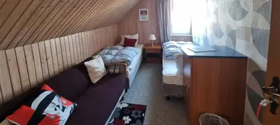 Ein Bett oder Betten in einem Zimmer der Unterkunft Zeitkapsel Braunlage
