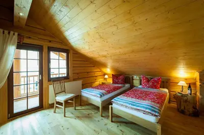 Ein Bett oder Betten in einem Zimmer der Unterkunft Chalet zum Salamander