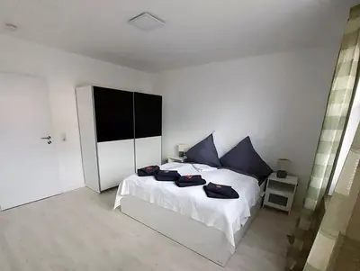 Ein Bett oder Betten in einem Zimmer der Unterkunft Apartment Weißer Burgunder