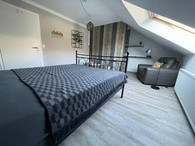 Ein Bett oder Betten in einem Zimmer der Unterkunft Schöne Höhe 600 FeWo Ausguck