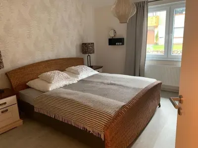Ein Bett oder Betten in einem Zimmer der Unterkunft Schöne Höhe 600 FeWo Ausblick