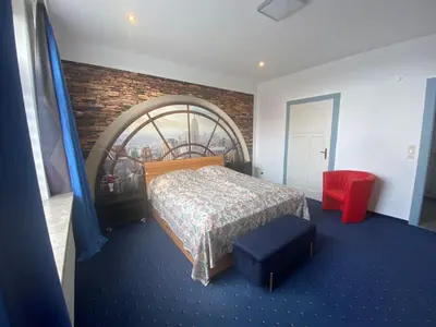 Ein Bett oder Betten in einem Zimmer der Unterkunft Sonneck