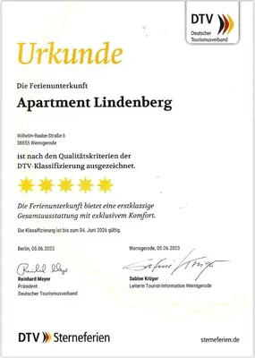Ein Zertifikat, Auszeichnung, Logo oder anderes Dokument, das in der Unterkunft Lindenberg Apartments ausgestellt ist