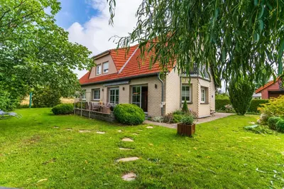 Ein Garten an der Unterkunft Familienurlaub im Grünen