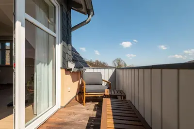 Ein Balkon oder eine Terrasse in der Unterkunft Premium Apartment - Ausblick - Kamin - Balkon - Smart TV - Kaffeevollautomat