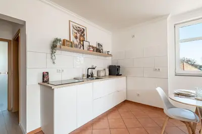 Küche/Küchenzeile in der Unterkunft Premium Apartment - Ausblick - Kamin - Balkon - Smart TV - Kaffeevollautomat