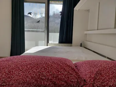 Ein Bett oder Betten in einem Zimmer der Unterkunft Schwalbennest