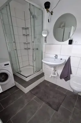 Ein Badezimmer in der Unterkunft Ferienwohnung am Friedenspark 2