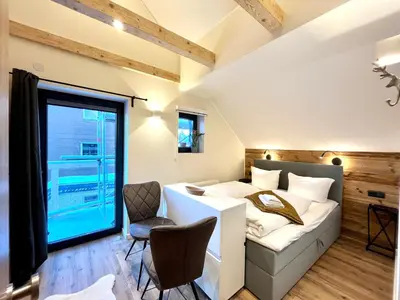 Ein Bett oder Betten in einem Zimmer der Unterkunft wohlBfinden2 appartementhaus