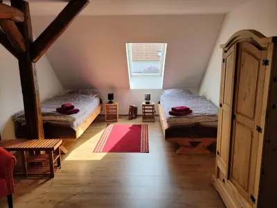 Ein Bett oder Betten in einem Zimmer der Unterkunft HarzRitter Domizil