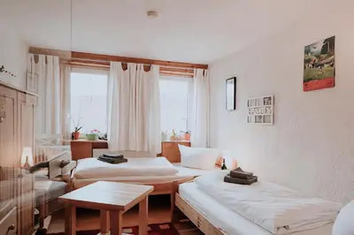 Ein Bett oder Betten in einem Zimmer der Unterkunft Hexenhütte