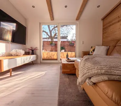 Ein Bett oder Betten in einem Zimmer der Unterkunft Ferienwohnung Häusli
