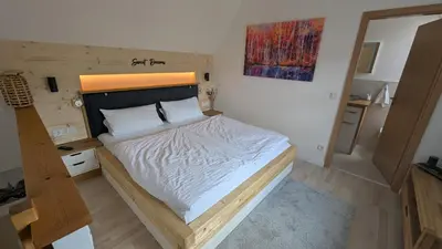Ein Bett oder Betten in einem Zimmer der Unterkunft Ferienwohnung Häusli