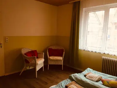 Ein Bett oder Betten in einem Zimmer der Unterkunft Haus am Fluss mit wunderschöner Dachterrasse mit Flussblick ,Garten und Grill