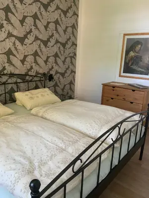 Ein Bett oder Betten in einem Zimmer der Unterkunft Almaresidenz