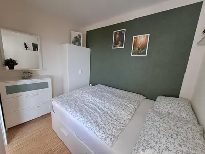 Ein Bett oder Betten in einem Zimmer der Unterkunft Ferienwohnung Skadi, Hahnenklee