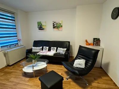 Ein Sitzbereich in der Unterkunft Ferienwohnung Le Petit