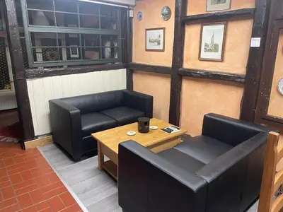 Ein Sitzbereich in der Unterkunft Zur zornigen Ameise