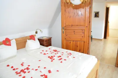 Ein Bett oder Betten in einem Zimmer der Unterkunft Maisonette-Appartement