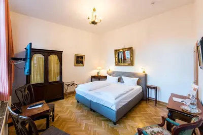 Ein Bett oder Betten in einem Zimmer der Unterkunft Ferienwohnung mit Balkon - a86244