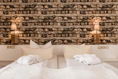 Ein Bett oder Betten in einem Zimmer der Unterkunft Ferienwohnung am Kurpark